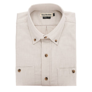 The Tom Beckbe Dixon Brushed Cotton Twill Shirt features a beige color, brown buttons, and a branded collar label.