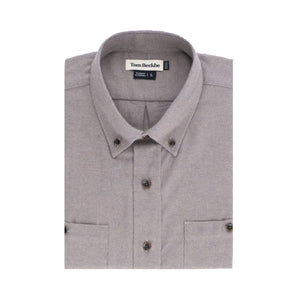 The Dixon Brushed Cotton Twill Shirt by Tom Beckbe in grey features two front pockets and a label inside the collar.