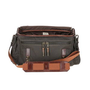 Front view of Canvas Field Bag showcasing open interior and front zippered pocket with a white background