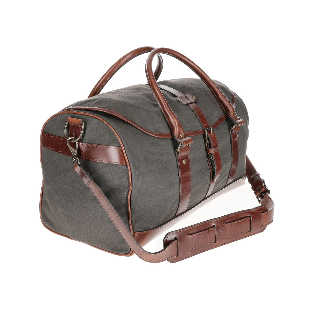 Green and brown Tom Beckbe Canvas Weekender Duffel Bag with leather details, perfect for travel.