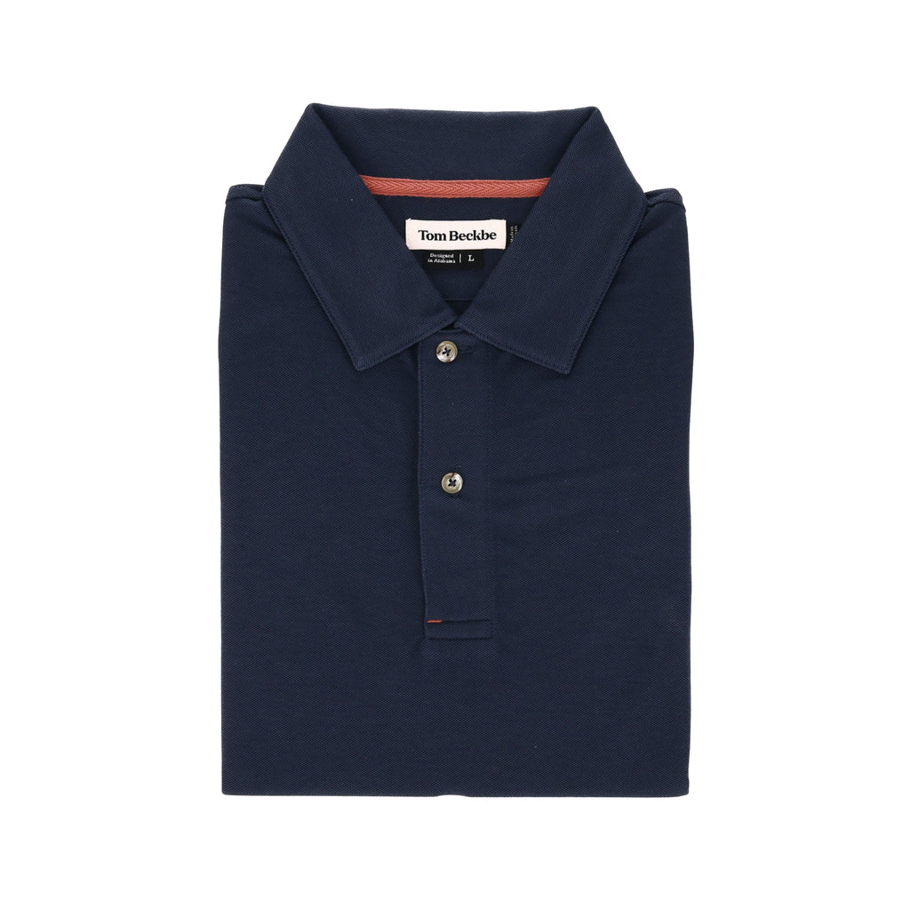 Coastal Polo Shirt by Tom Beckbe: Navy blue, folded, with collar and two buttons, label inside the collar.