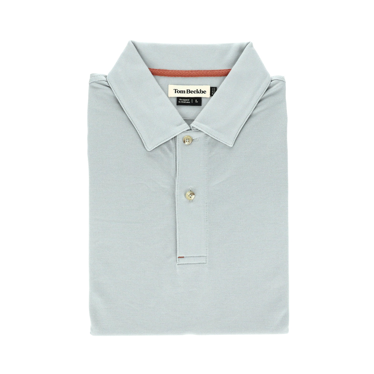 Folded Tom Beckbe Coastal Polo shirt in light gray with a collar, three buttons, and neck label.