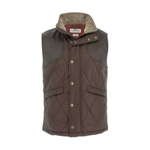 Tom Beckbe Paddock Quilted Vest: brown, weatherproof, snap closure, high collar, and two pockets on a white background.