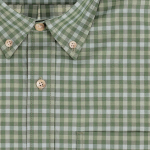 Close-up of the Tom Beckbe Powell Performance Shirt in green and white checks with beige buttons and front pocket.