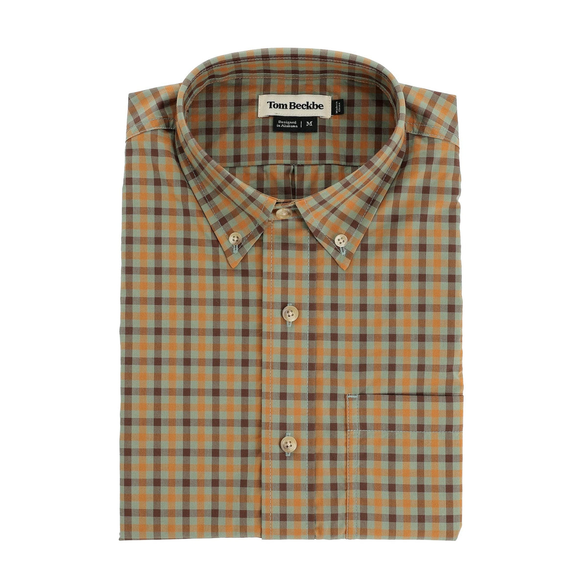 The Tom Beckbe Powell Performance Shirt features orange, blue, and tan plaid, front pocket, collar, and UPF 30+ protection.