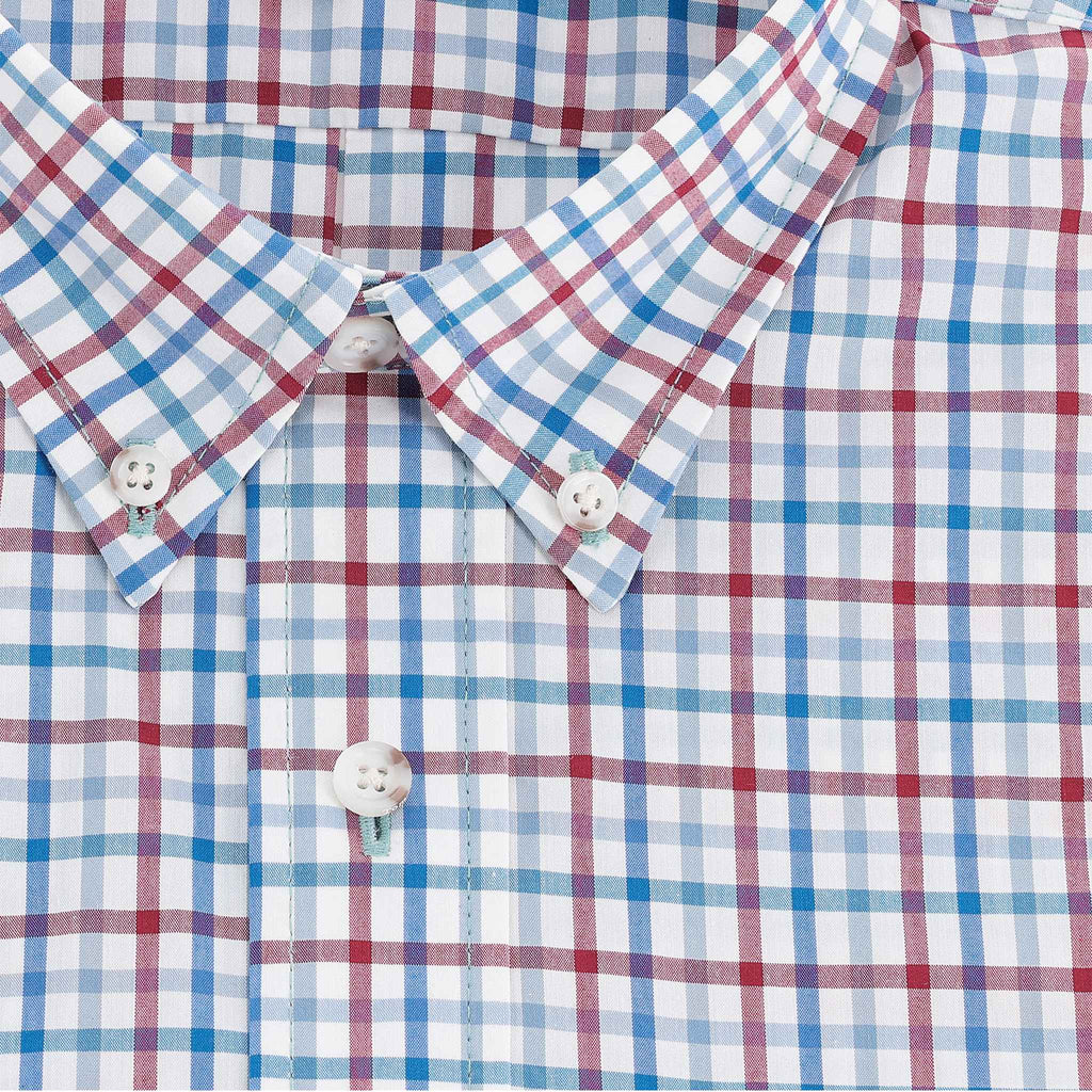Close-up of the Tom Beckbe Powell Performance Shirt (Short Sleeve) with red, blue, and white checks and white buttons.