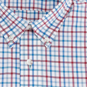 Close-up of the Tom Beckbe Powell Performance Shirt (Short Sleeve) with red, blue, and white checks and white buttons.