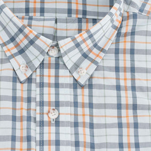 Close-up of the Tom Beckbe Powell Performance Shirt, short sleeve with blue, orange, and white plaid and white buttons.