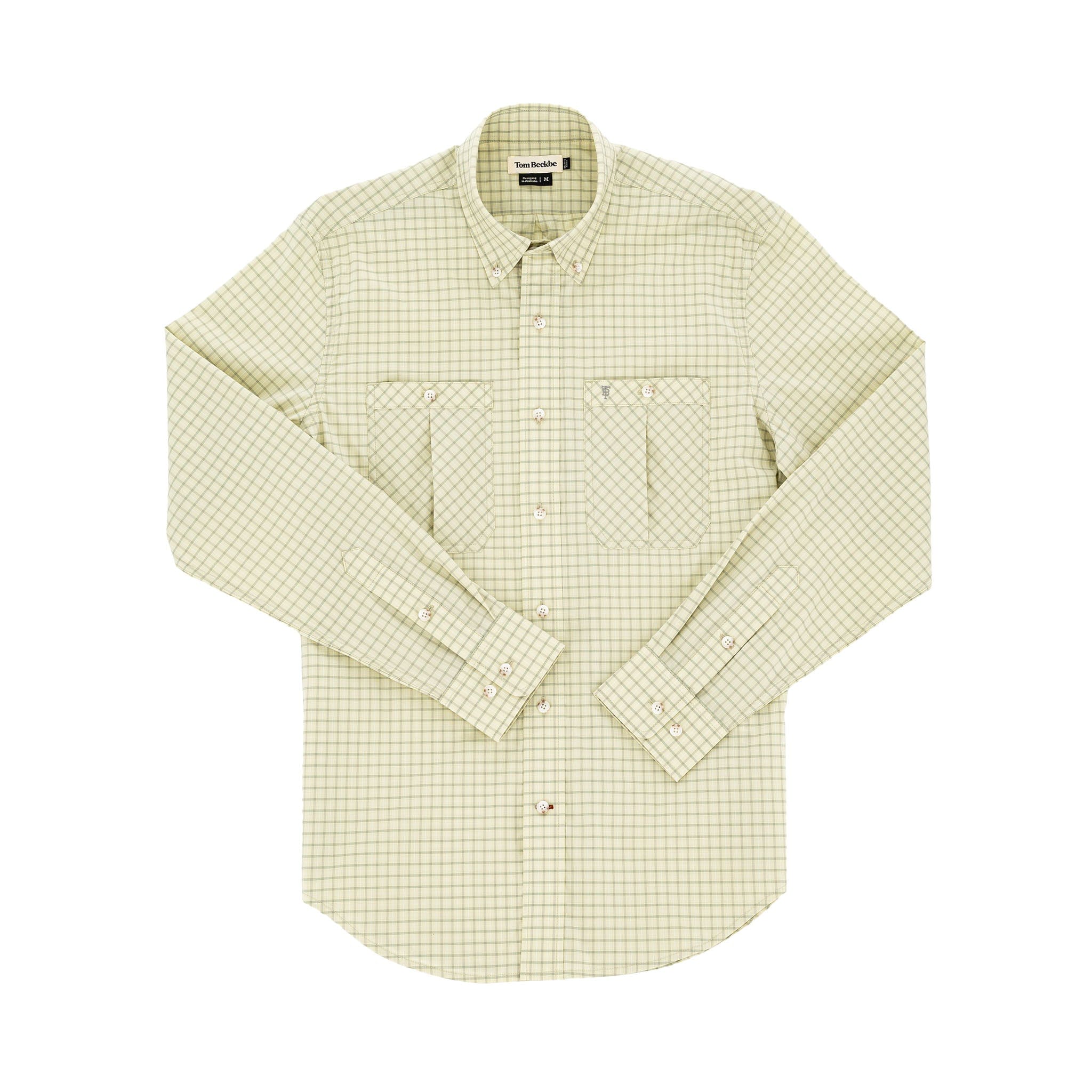 The Tom Beckbe Tidewater Shirt, light green with button pockets, offers UPF 30+ coverage on a white background.