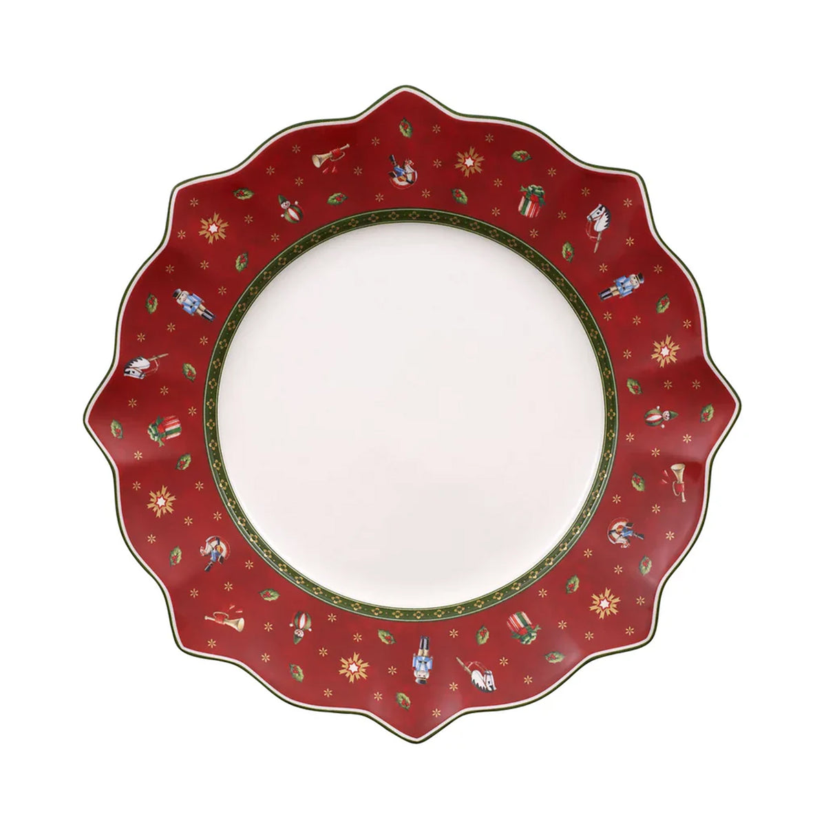 Top view of Toys Delight 11.5-inch flat porcelain plate with scalloped red holiday border featuring nutcrackers and gifts
