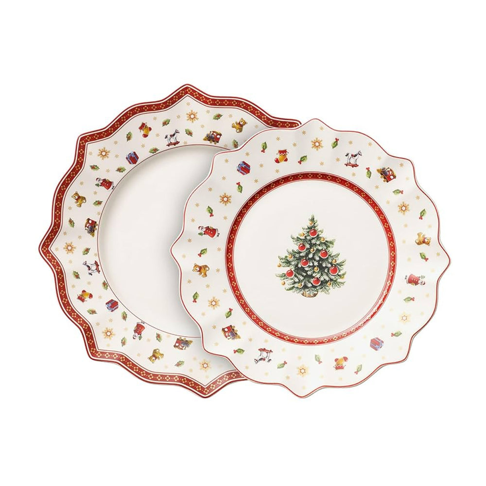 Top view of Toys Delight 8-piece porcelain plate set showing scalloped rims and Christmas tree and toy illustrations on a white background