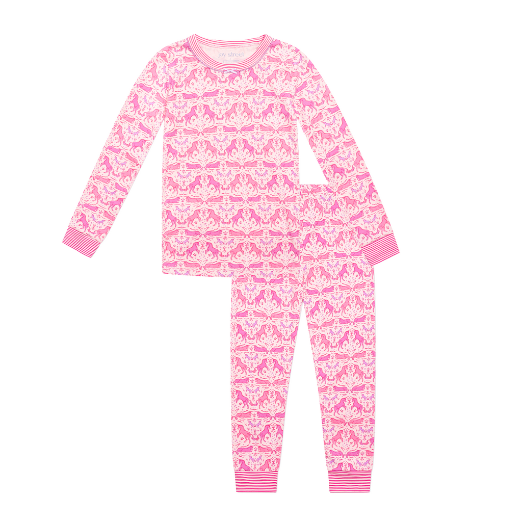 Front view of pink unicorn kids pajamas set of 2 showcasing long sleeves and ribbed cuffs with a white background