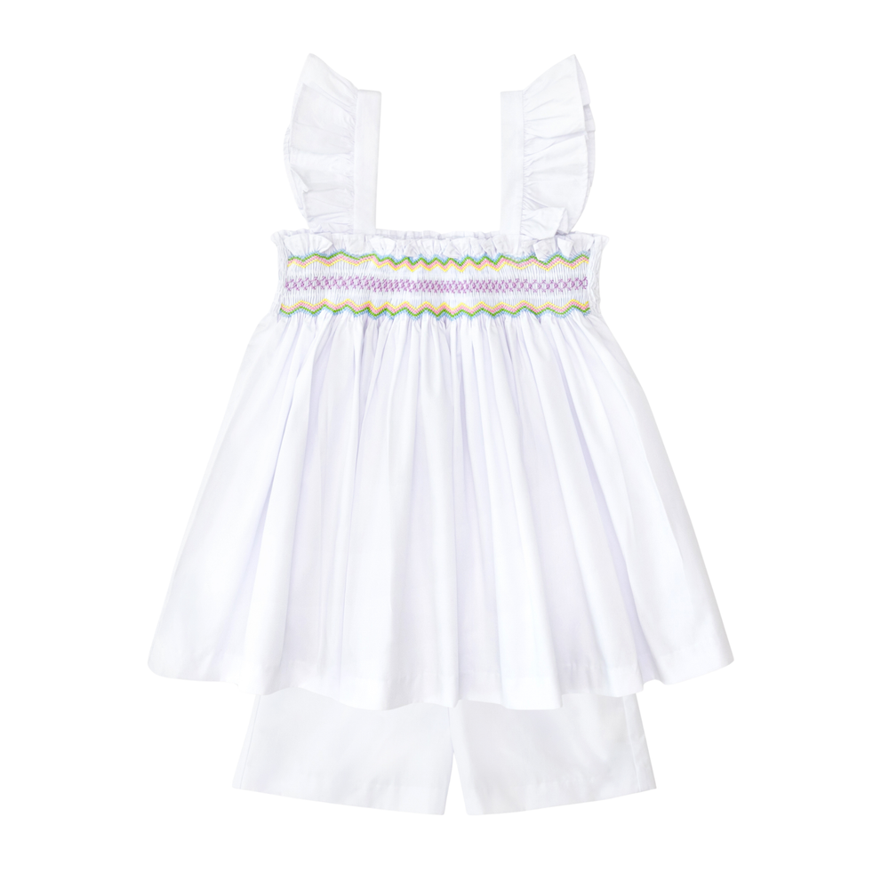 Henry Duvall girls smocked shorts set in Classic White, a classic two-piece outfit with flutter sleeves and blue embroidered smocking.