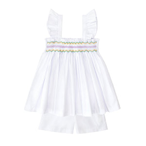Henry Duvall girls smocked shorts set in Classic White, a classic two-piece outfit with flutter sleeves and blue embroidered smocking.