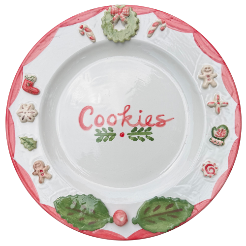 Front view of Christmas cookies plate showcasing hand-painted holiday motifs and Cookies lettering on a white background