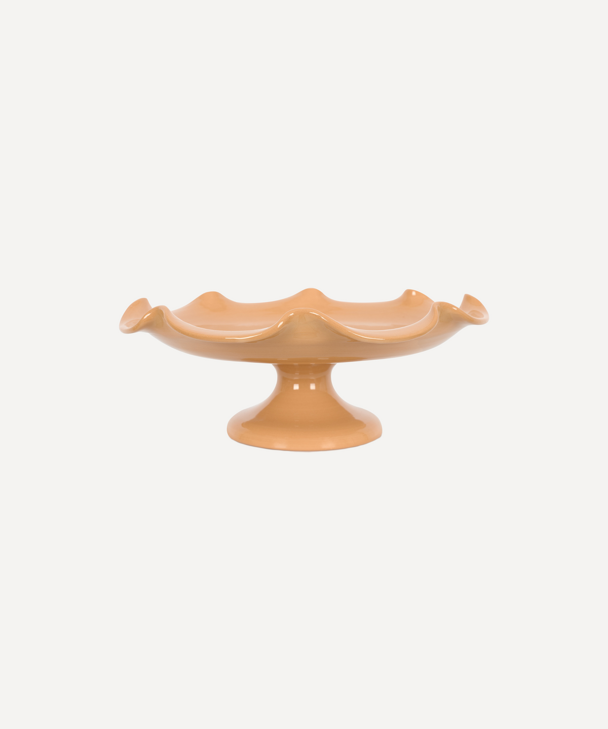 Front view of Claudia Wavy Footed Bowl in Terracotta showcasing its wavy edge and footed base with a white background