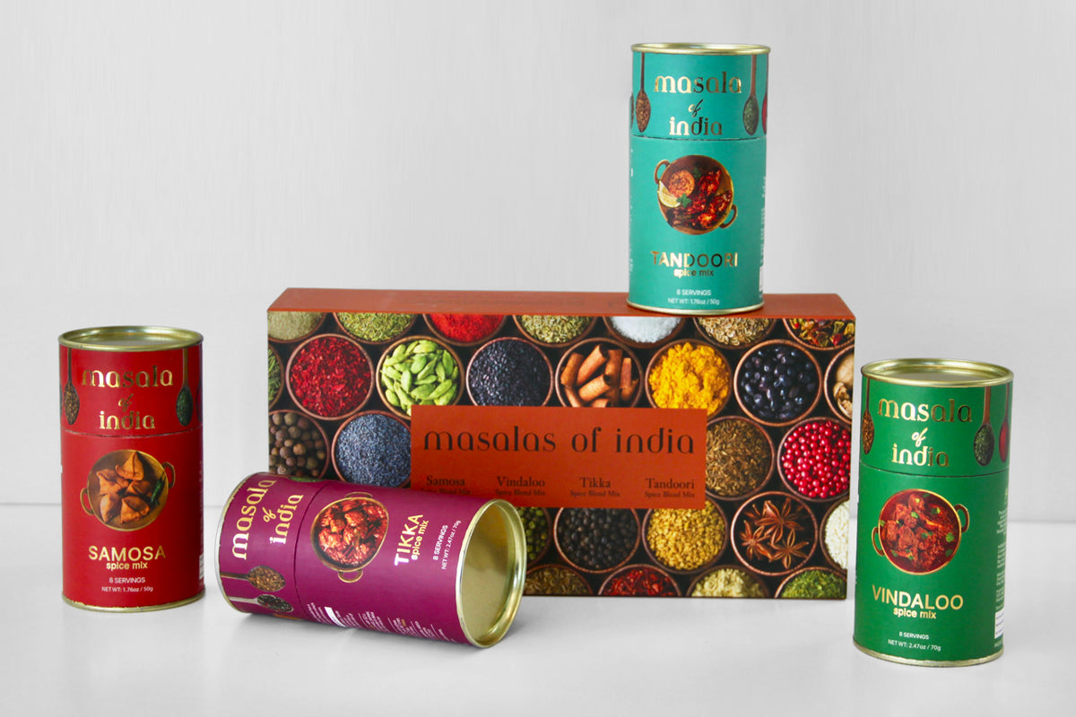 Front view of Masala Spices of India Gift Box with Samosa, Tandoori, Tikka, and Vindaloo spice blends on gray background