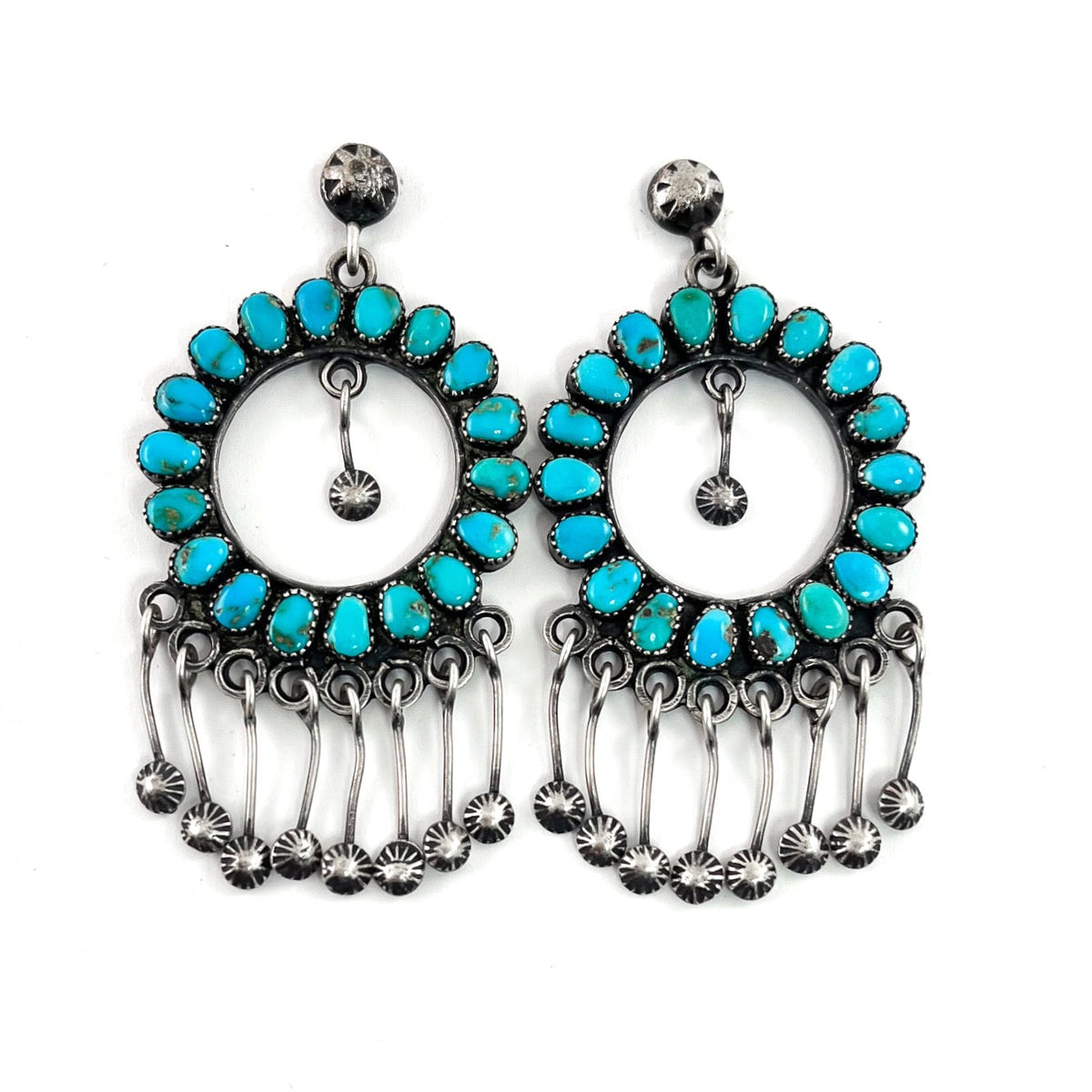 Front view of vintage hoop earrings showcasing American turquoise stones, sterling silver and dangling star studs on white background