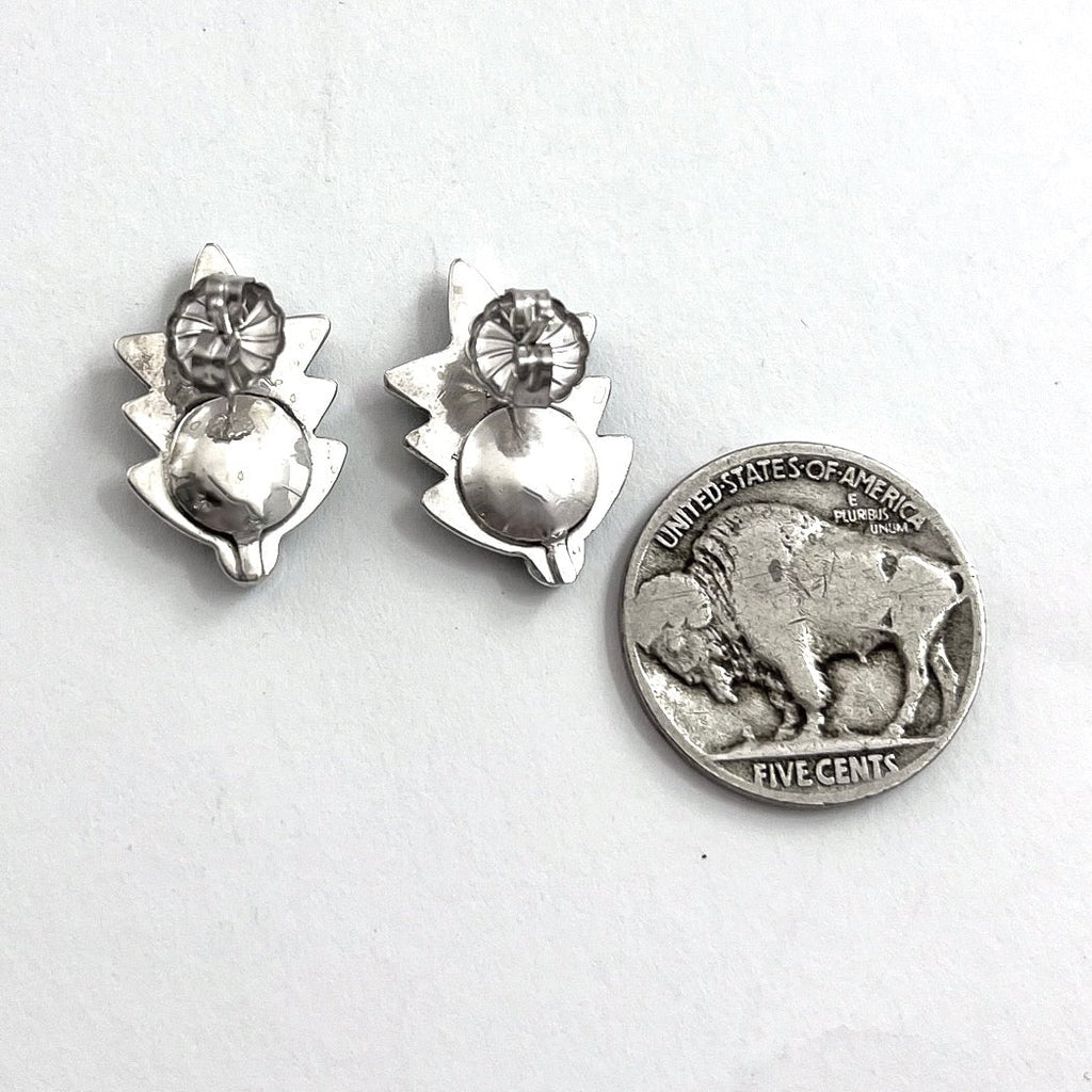Close-up of Small Turquoise Leaf Stud Earrings showing sterling silver leaf designs and Sleeping Beauty turquoise on white