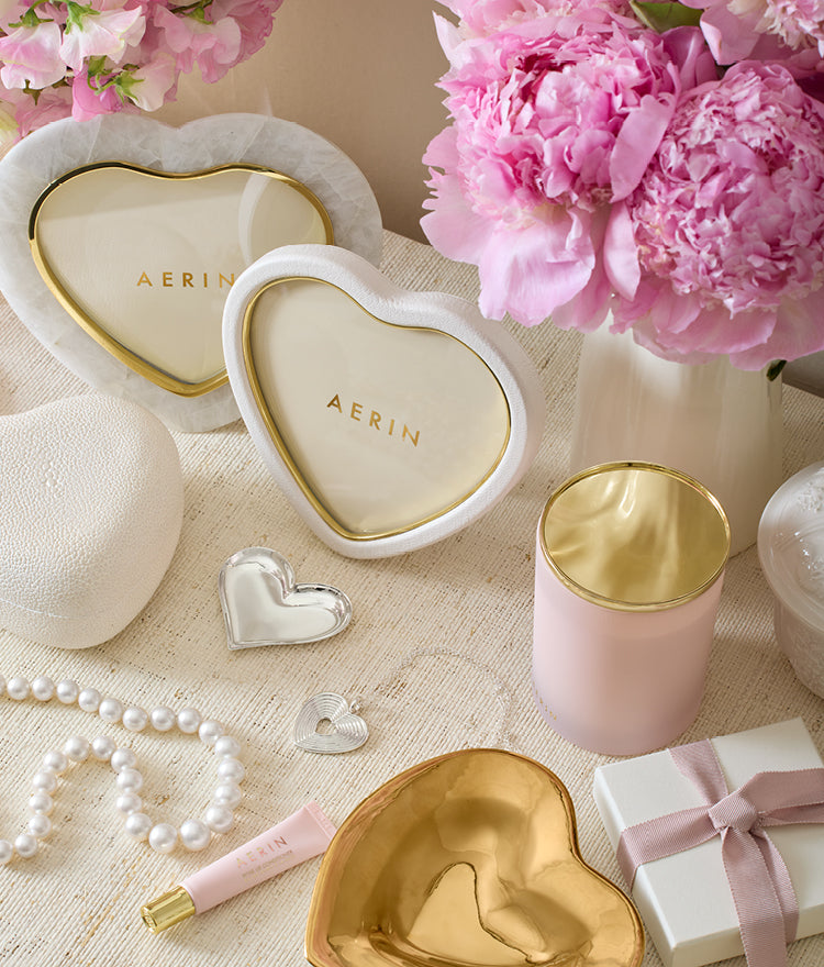 Front view of Cassiel Mosaic Heart Frame in White Quartz showcasing brass edging with a floral gift setting