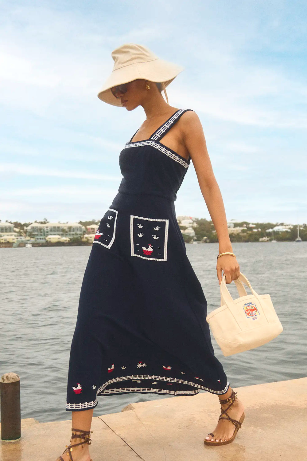 The Vaughn Dress in Deep Sea with the mini tote bag.