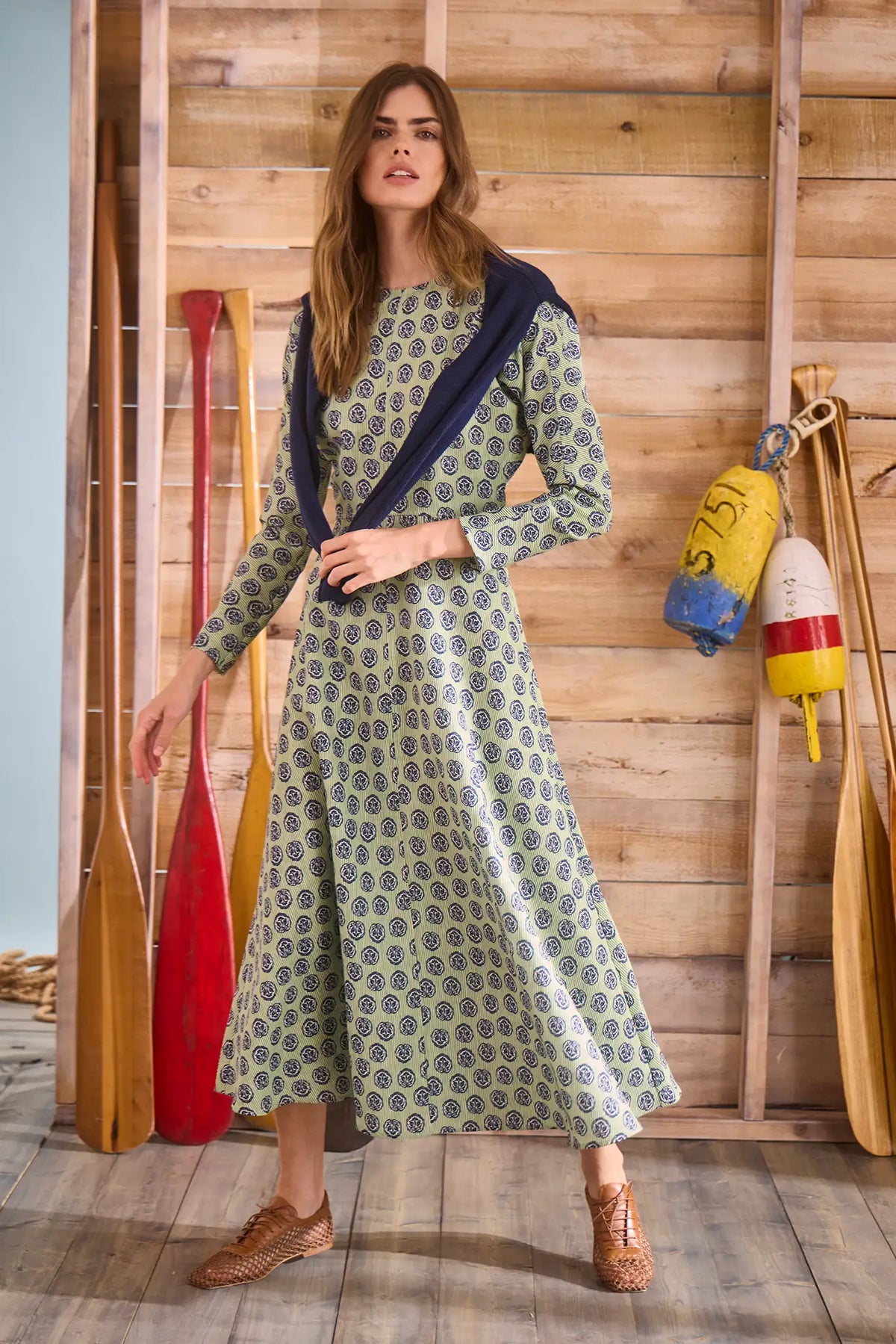 Midi dress with a clean crew neckline, modern dolman sleeves, with a circle-cut skirt.