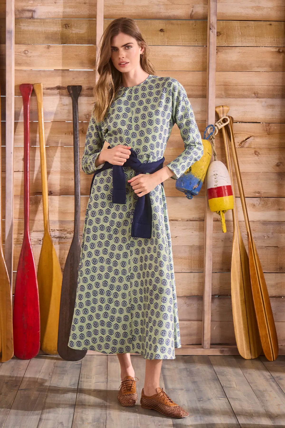 Midi dress with a clean crew neckline, modern dolman sleeves, with a circle-cut skirt.