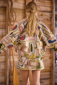 Throw-on jacket with curved, open front, and dolman sleeves.