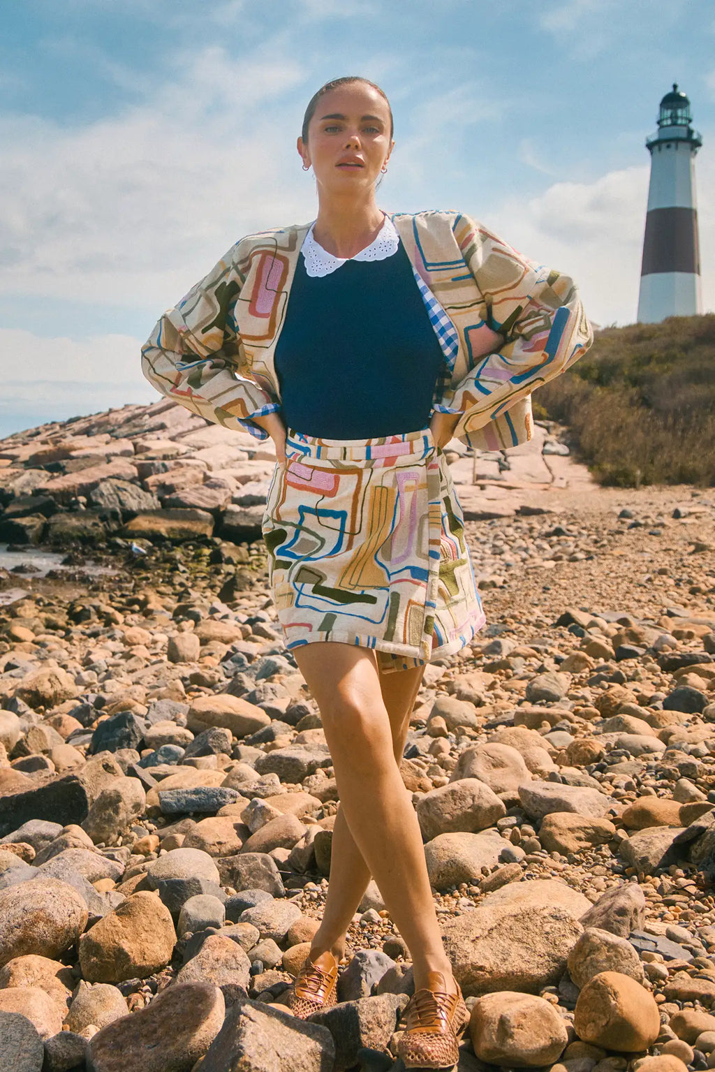 Throw-on jacket with curved, open front, and dolman sleeves.