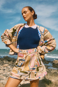 Fitted long-sleeve sweater with a delicate lace-look and eyelet-detailed collar. 