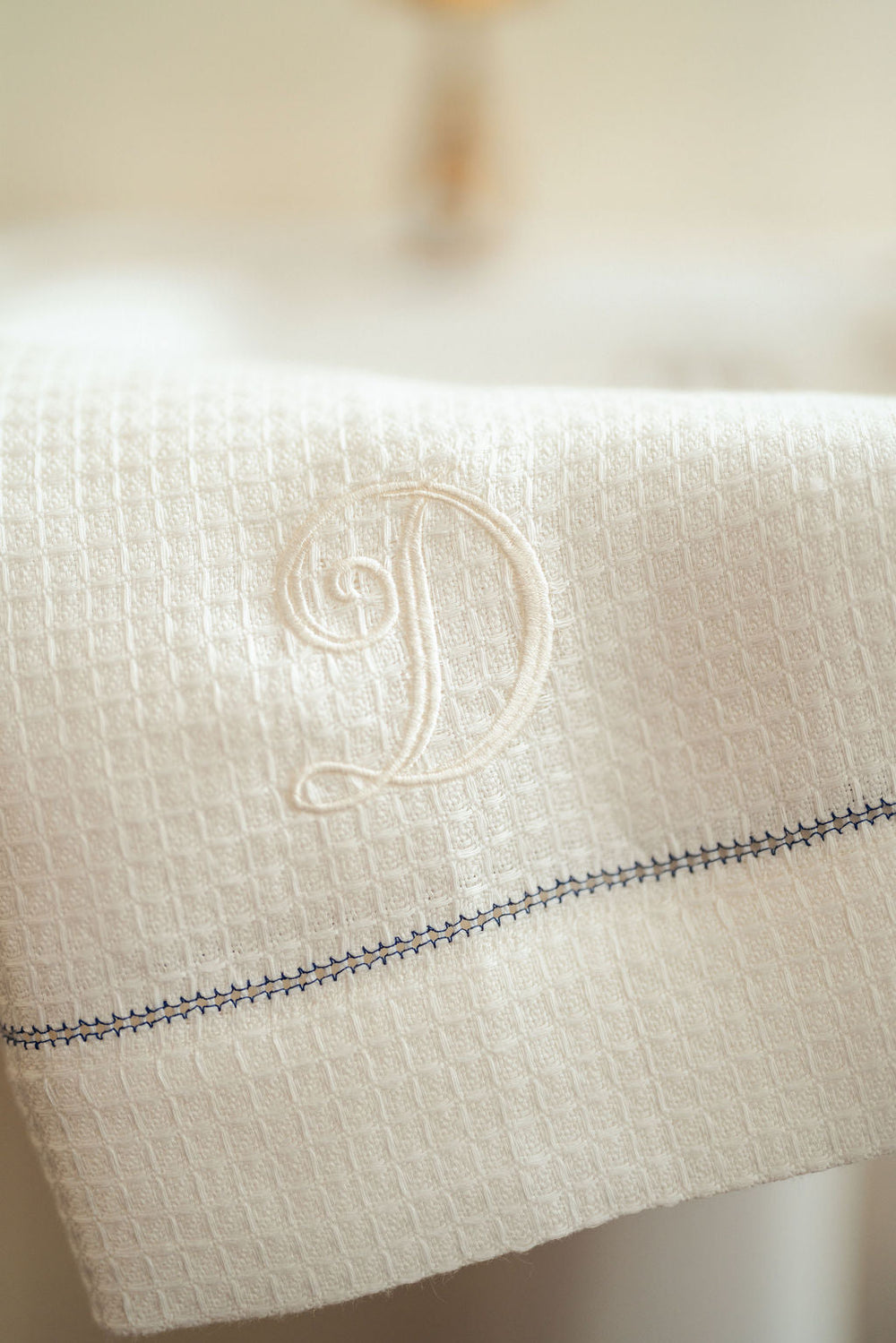 Liege Hand Towel in Ivory White Waffle with Indigo Hemstitch