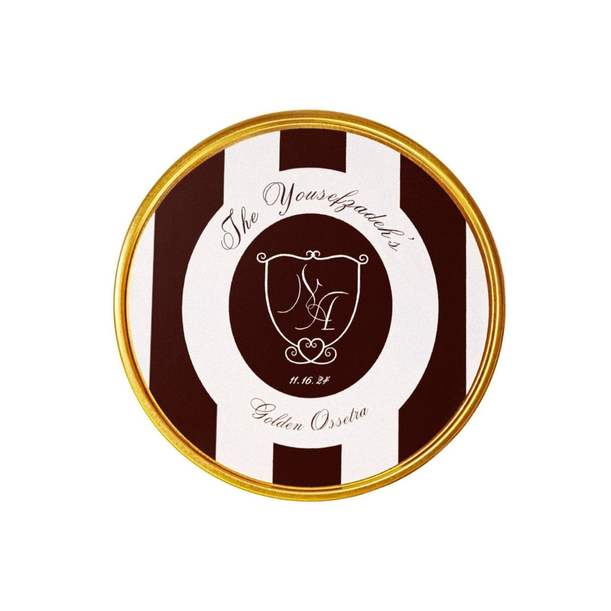 Top view of Bespoke Wedding Caviar Kilo tin lid with personalized wedding crest and gold rim on brown-and-white stripes