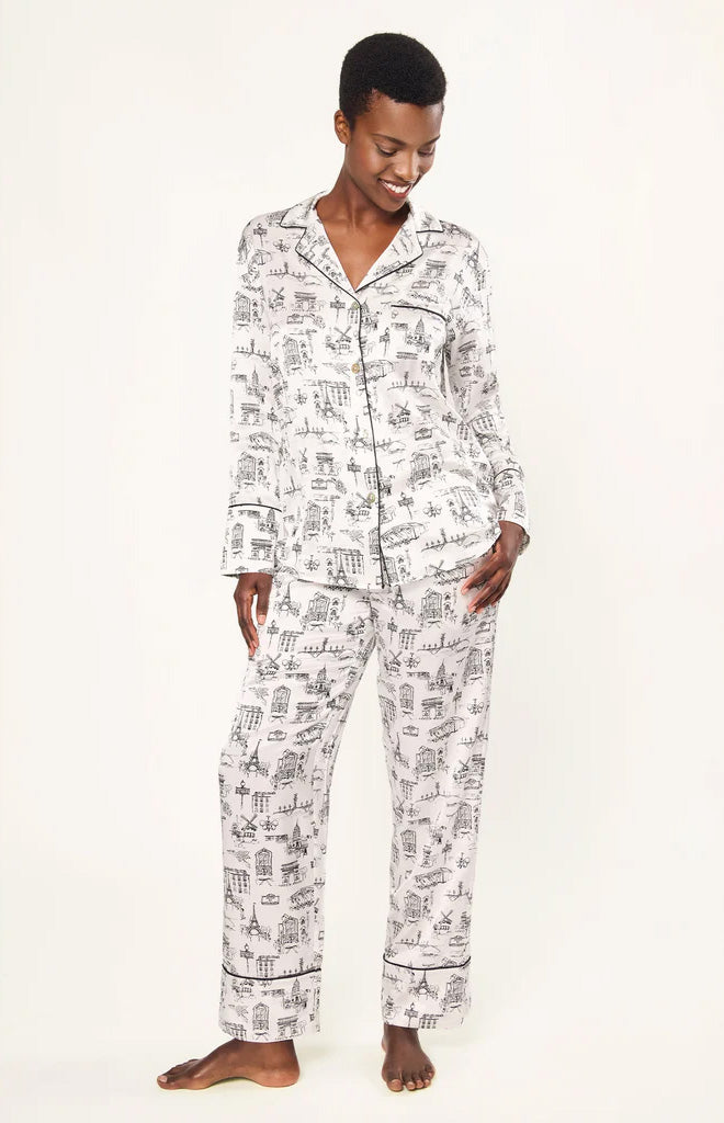 Front view of Women’s Silk Pajama Set in Parisian Toile showing long sleeves and tailored piping on a model against white