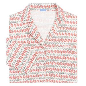 Front view of Christmas Lobster women’s pajama top showcasing button-front collar and red-green lobster print on white background