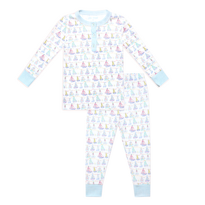 Front view of Holiday Harbor pajamas set with a henley top, matching pants, colorful sailboats, and blue striped trim