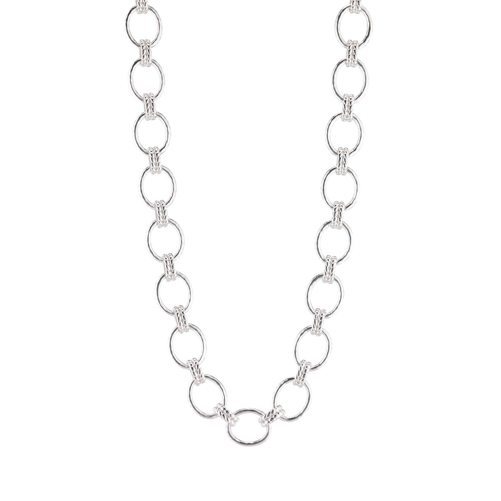 Front view of Cleopatra Grande Link Necklace in silver showcasing oversized hammered links and braided motif on white background