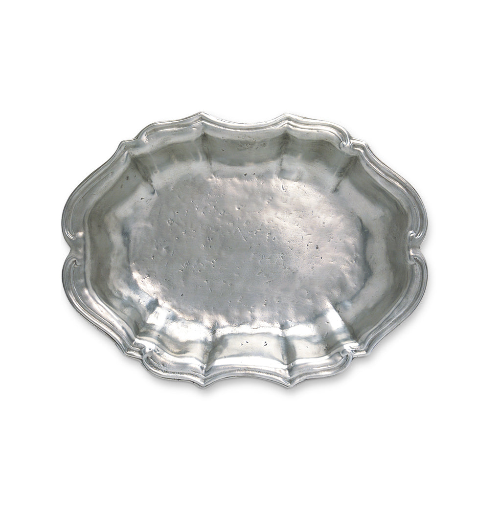 Top view of Queen Anne Oval Bowl showcasing scalloped edges and pewter finish with white background