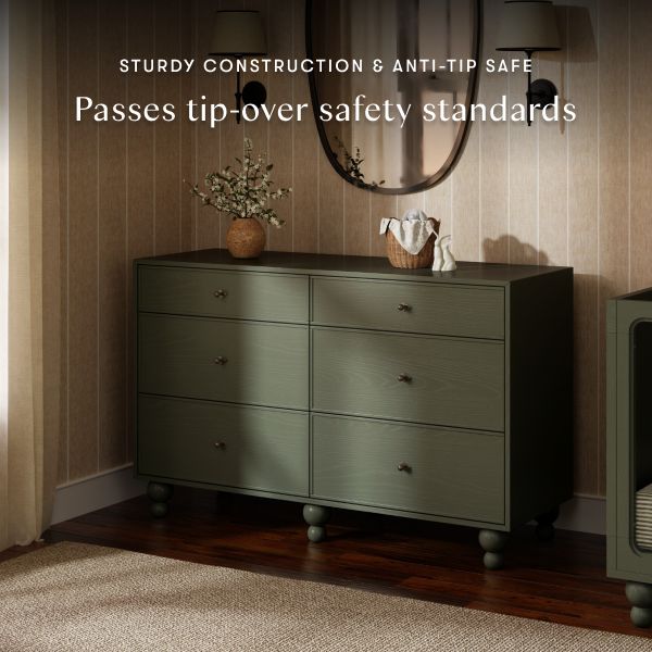 Front view of Nate Berkus Astre six-drawer dresser in Archival Elm with sturdy construction and anti-tip safety text