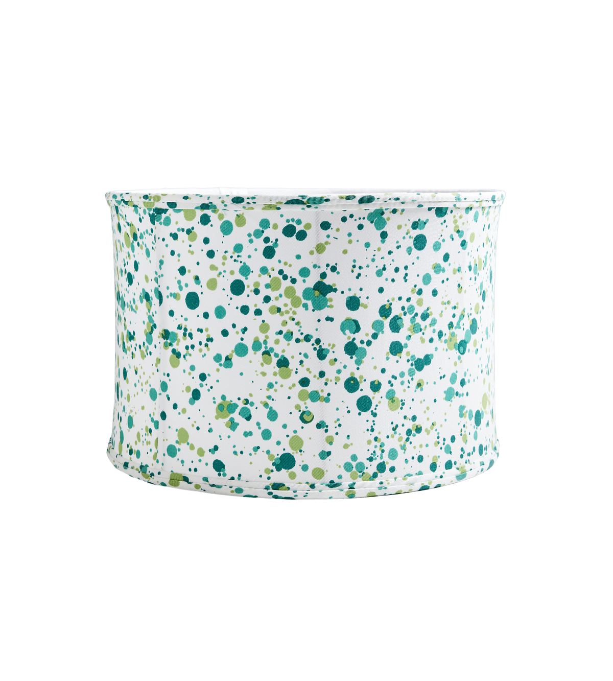Front view of Spatter drum shade showcasing green paint-splatter pattern on white fabric against black background