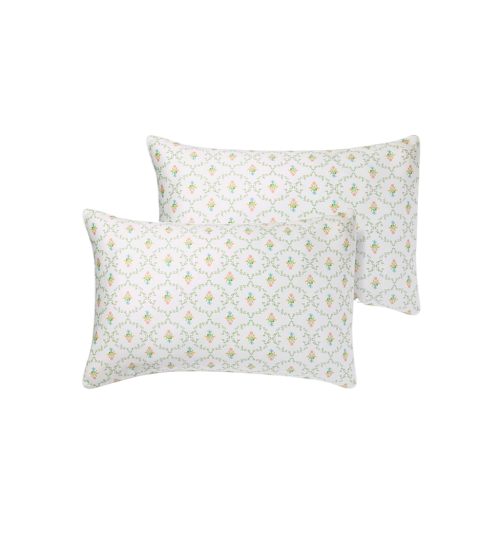 Front view of Pastel Trellis pillowcase set of two showcasing small pastel floral trellis pattern on white background