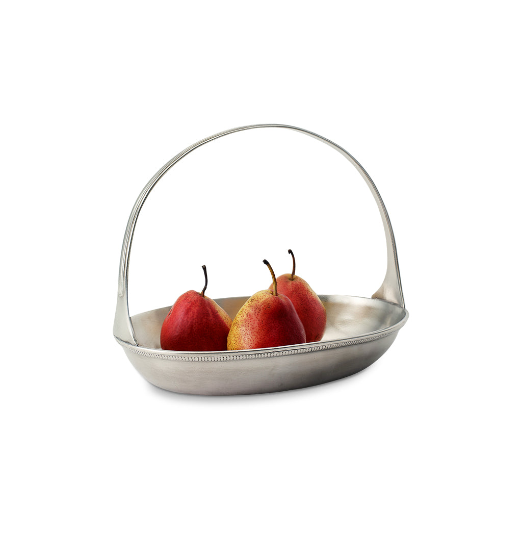 Front view of Oval Basket Bowl, Medium showcasing graceful handles and pears with a white background