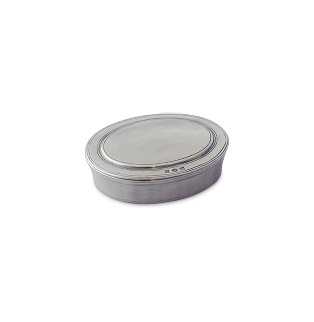 Angled view of the Oval Dresser Box, Medium showcasing its oval pewter design and fitted lid on a white background