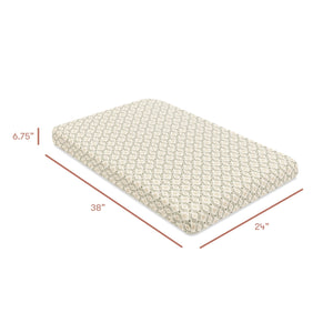 Angled view of mini crib sheet in Juniper Star organic brushed cotton showing 6.75, 38, and 24 inch dimensions