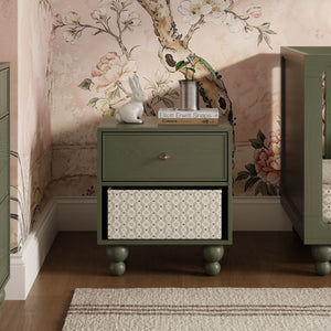 Front view of Astre assembled nightstand by Nate Berkus in Archival Elm showcasing a green finish and patterned drawer front