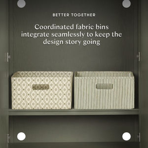 Interior of Astre Assembled Armoire in Archival Elm showcasing coordinated fabric bins with Better Together text