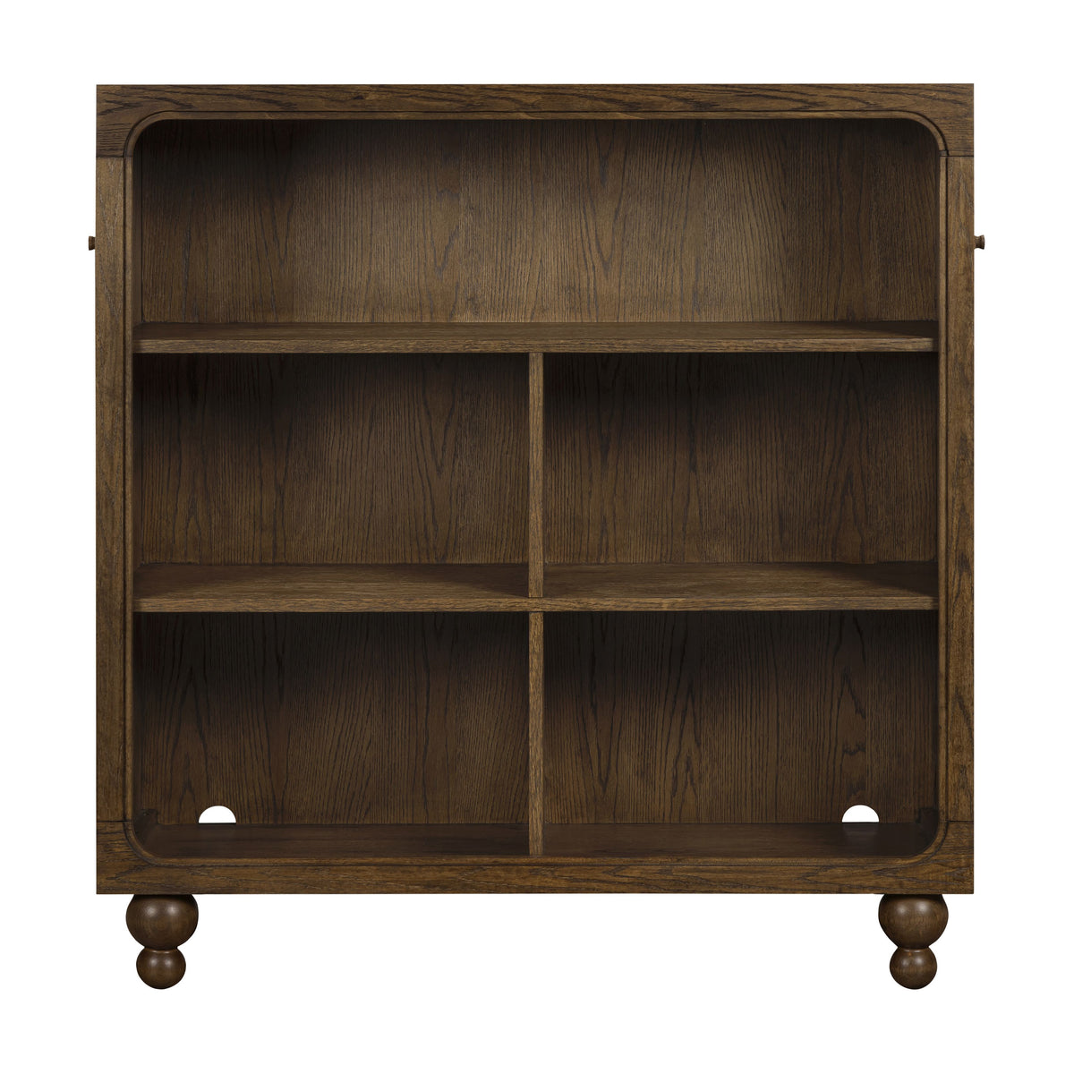 Front view of Astre assembled bookcase in Toffee showcasing rounded corners and spherical feet on a white background
