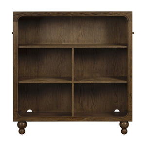 Front view of Astre assembled bookcase in Toffee showcasing rounded corners and spherical feet on a white background