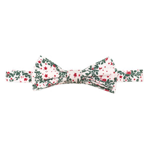Boys’ Baker Bow Tie in Regent Wreaths, a festive red and green holiday print on a classic white background.
