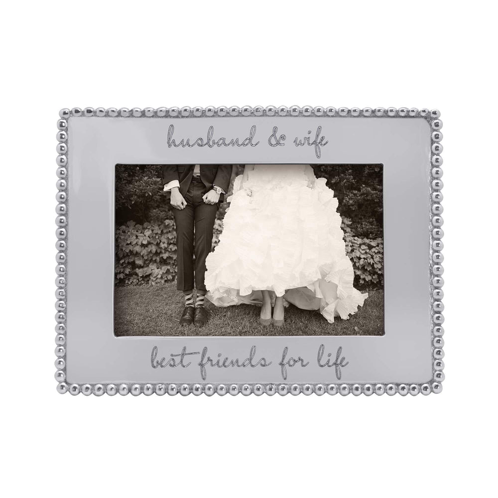 Front view of beaded 4x6 engravable frame with engravings husband and wife and best friends for life on white background