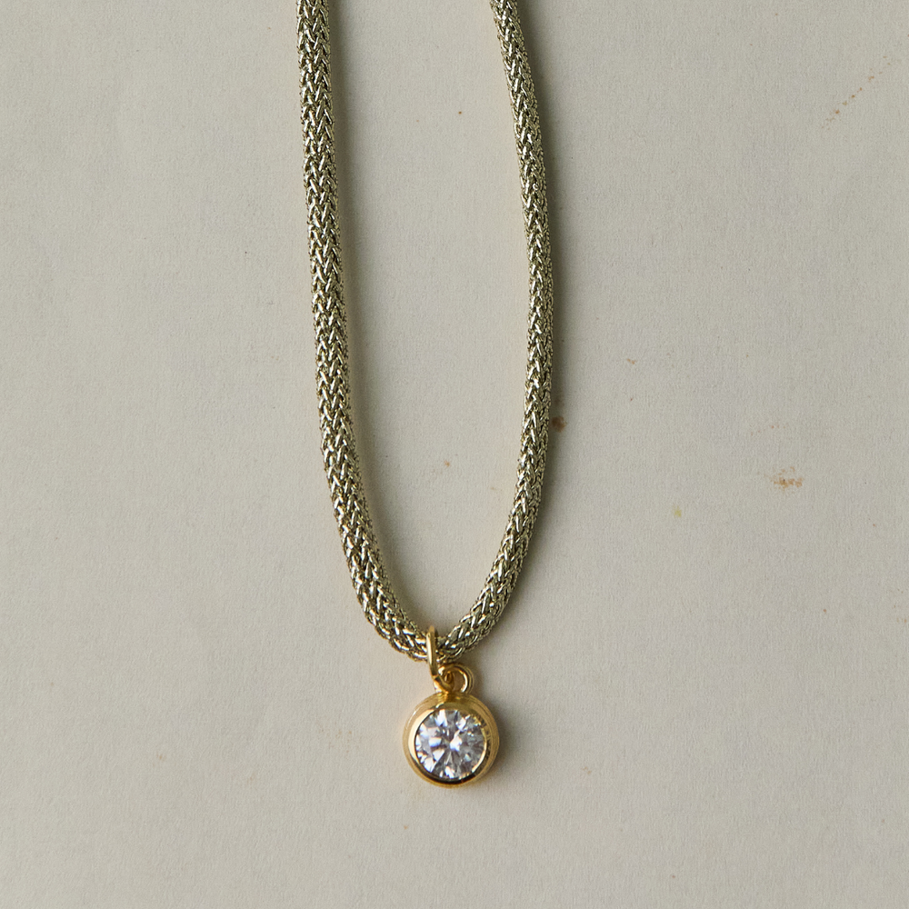The Bezel Charm on Gold Lurex Cord